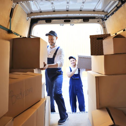 moving-company-merchant-services-unloading-boxes moving company merchant services unloading boxes