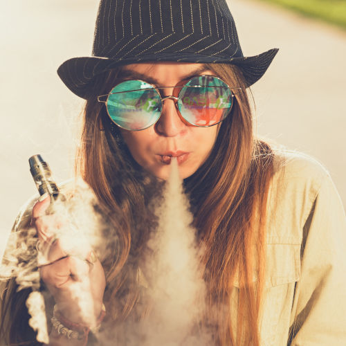 cbd-vape-square-small-woman-vaping-hemp-oil-pen